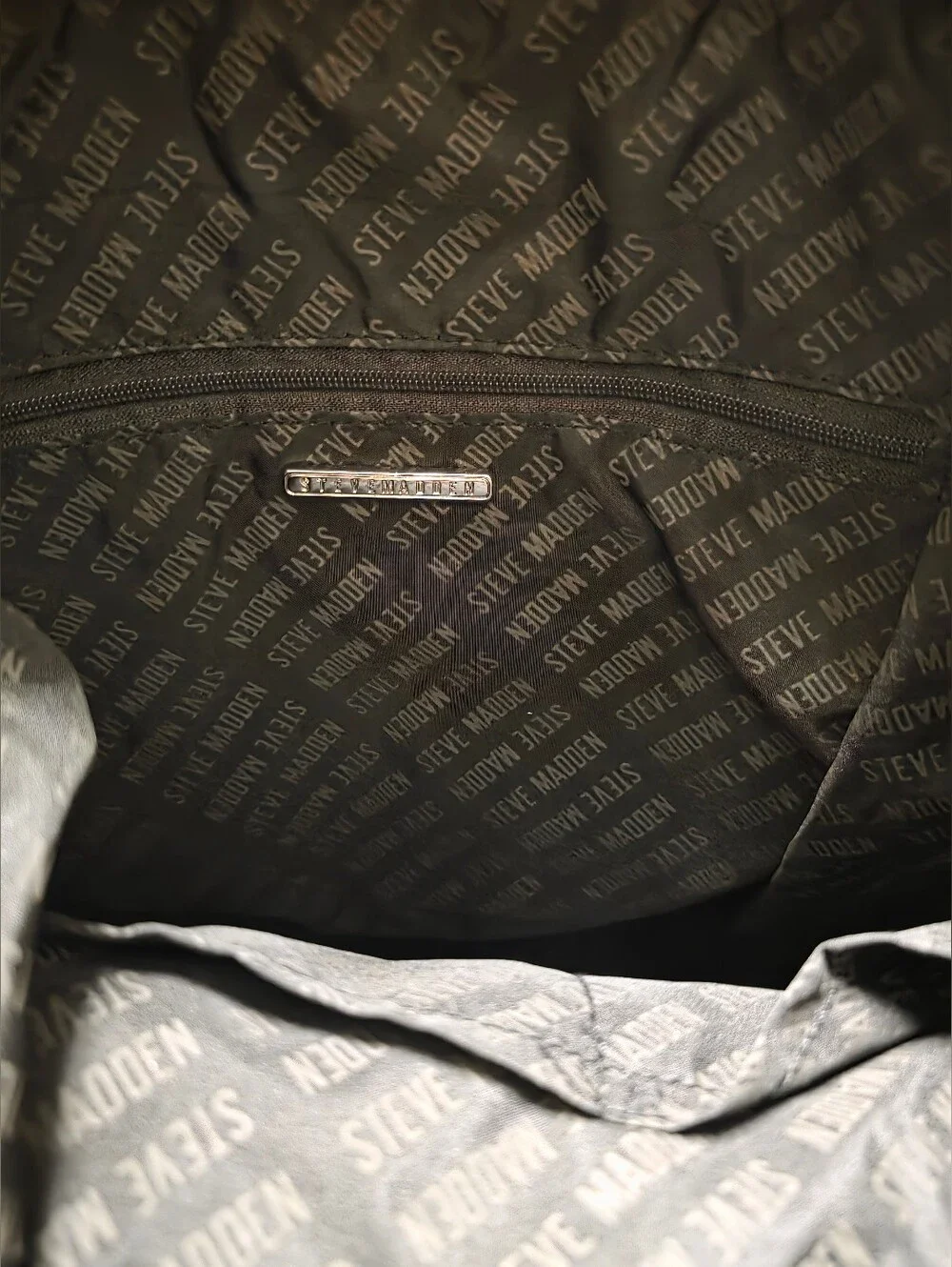 Steve Madden Black Quilted Nylon Backpack with Front Zip Pocket